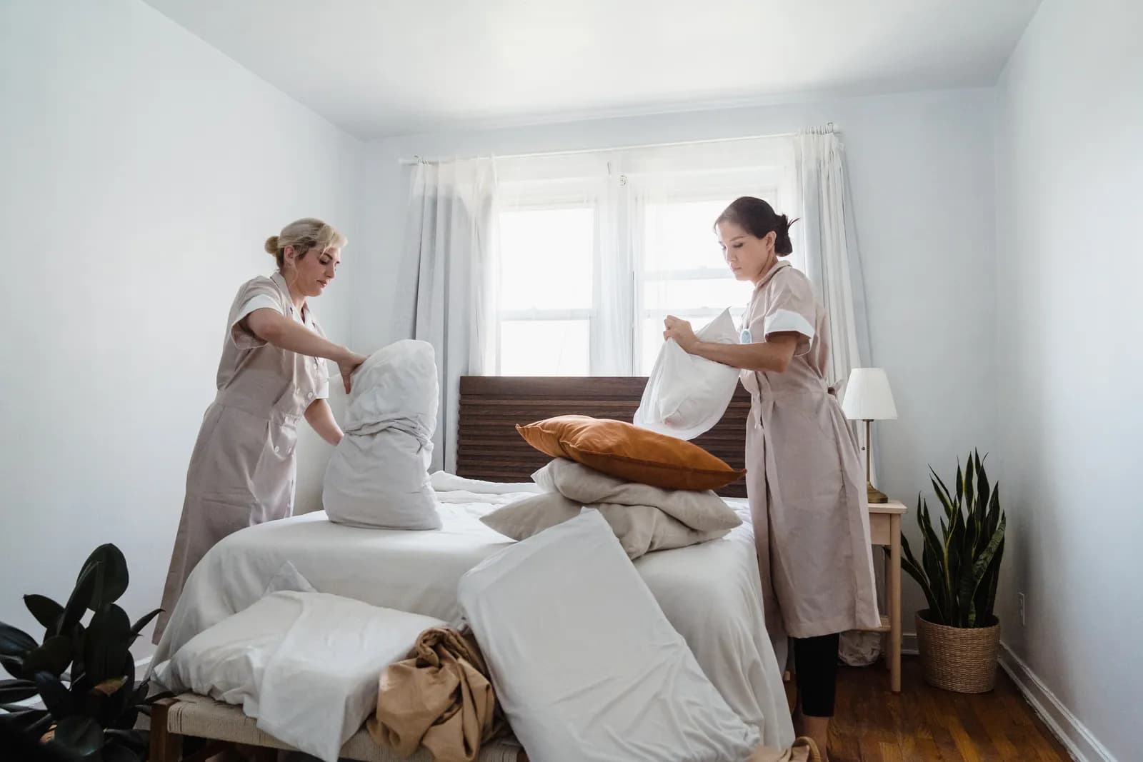 Immaculate Airbnb bedroom and crisp staged linens